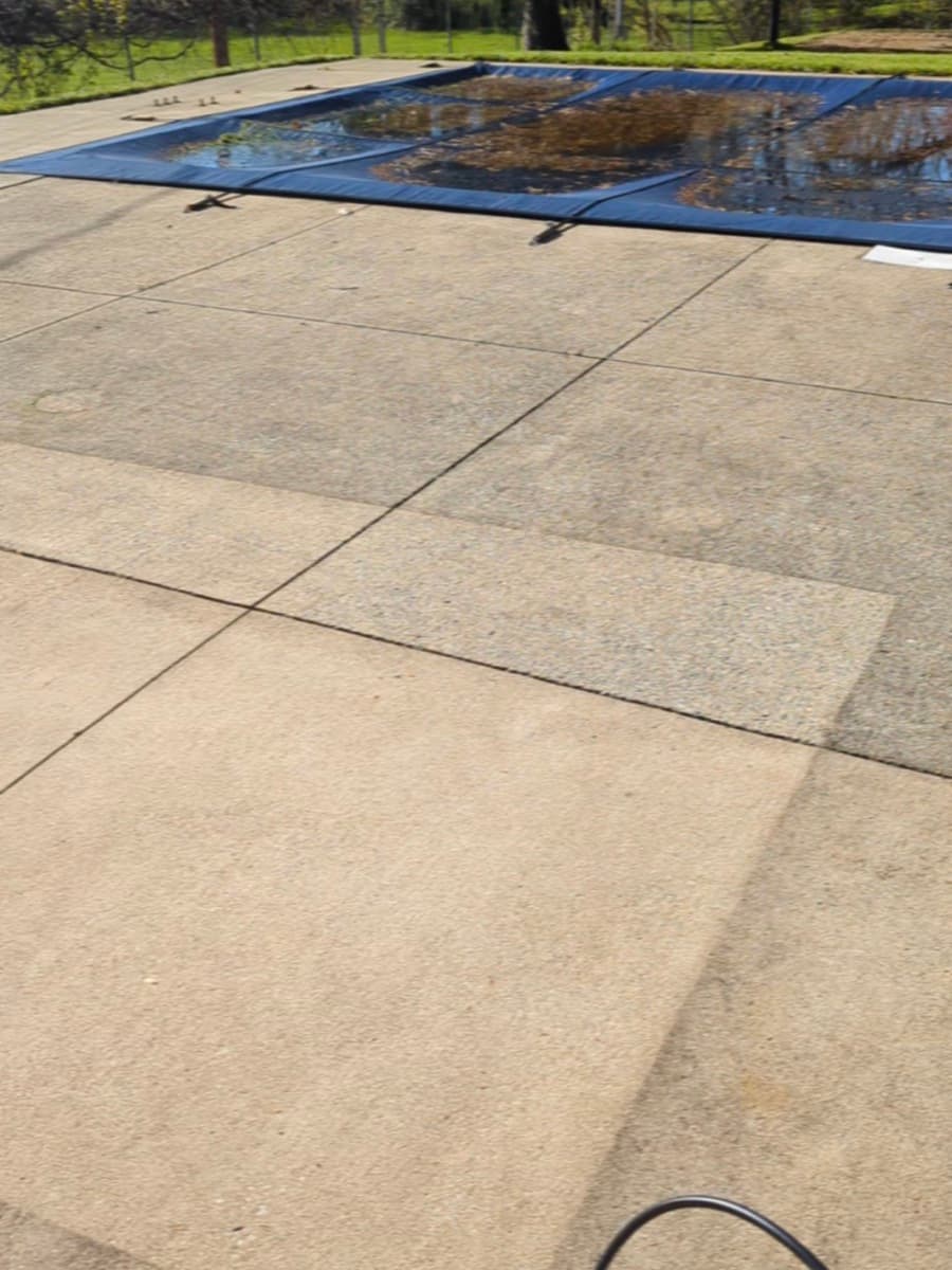 Dirty pool patio concrete in Ashland, Ohio — before pressure washing